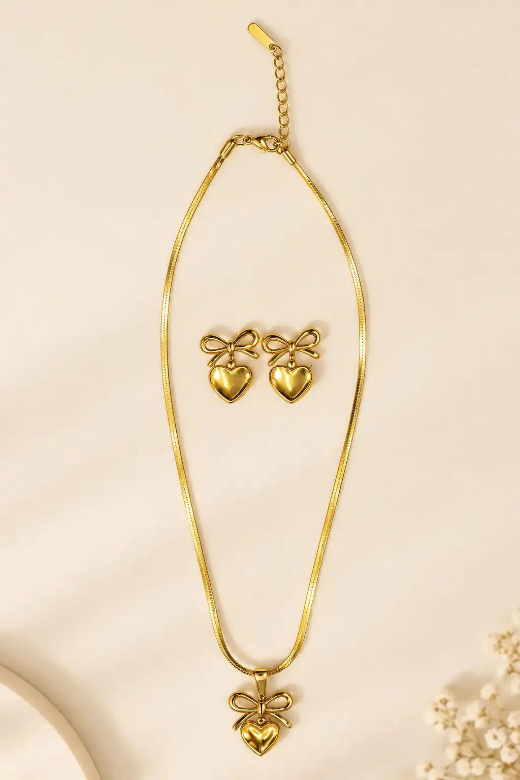 Gold Bow  and Heart Jewellery.